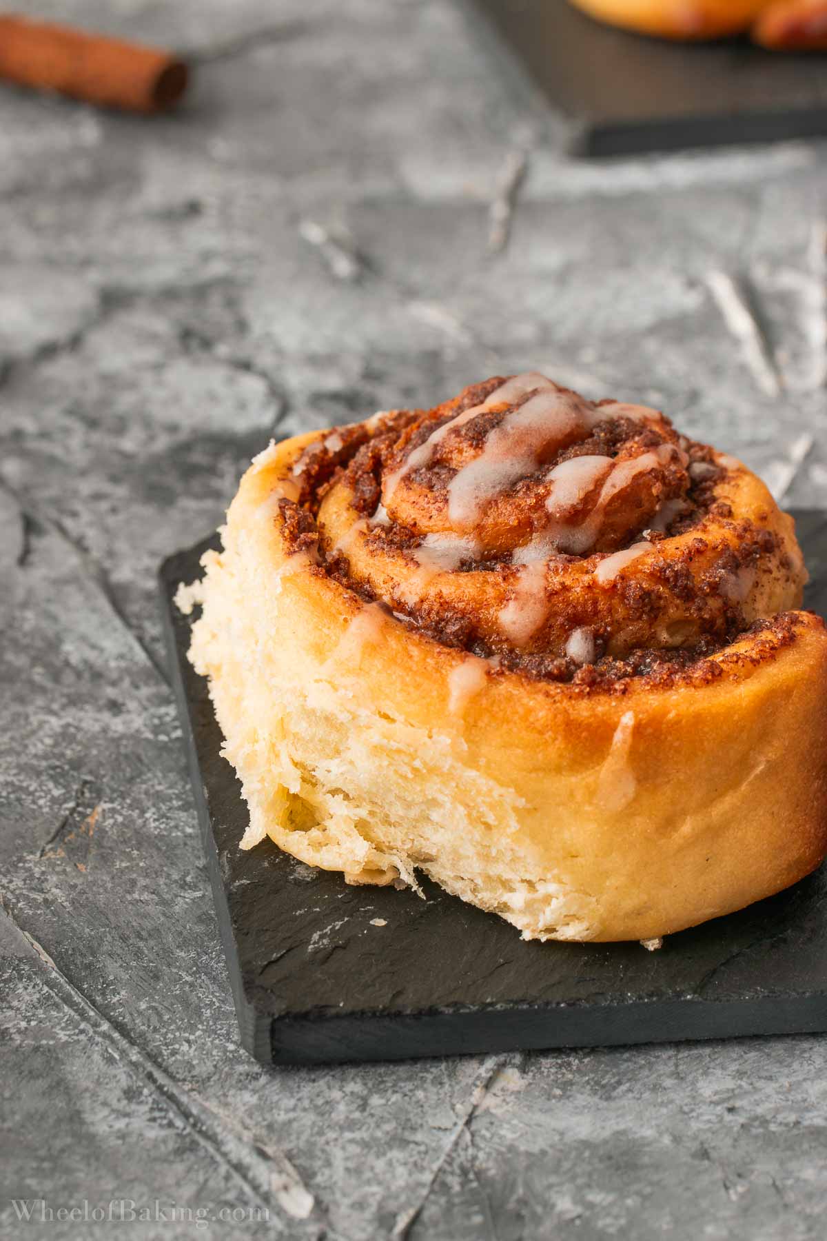 Tangzhong cinnamon roll  drizzled with icing.